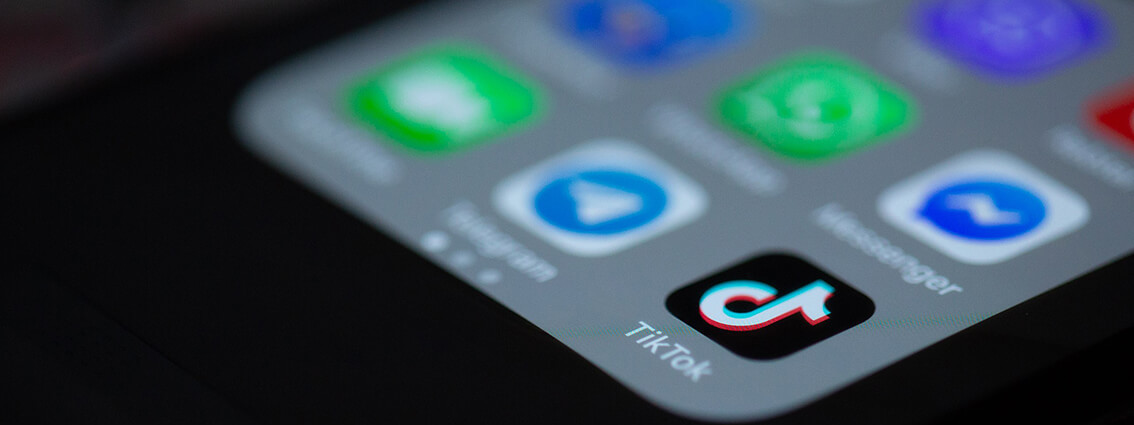 Photograph of An Iphone Focussed on The TikTok App Icon
