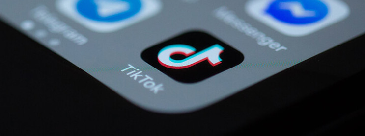 Photograph of An Iphone Focussed on The TikTok App Icon