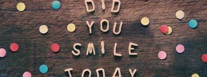 Colourful Polka Dots on Wooden Background With 3D Physical Lettering Asking 'Did You Smile Today?'